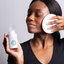 BHA acid exfoliant being applied to face to help remove dead skin cells and hydrate