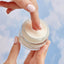 Jar of tripeptide plumping face cream, showing lightweight texture for sensitive skin